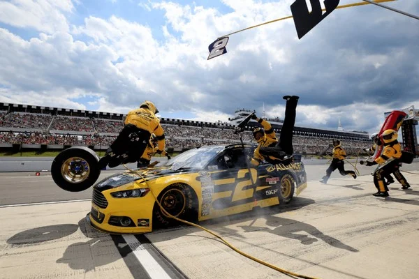 Why does pit window timing alter outright racing bets?